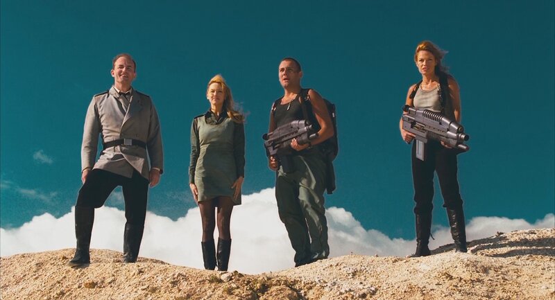 Four Armed People on Hill