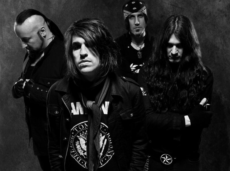 Four Band Members — Black, Serious, Photograph