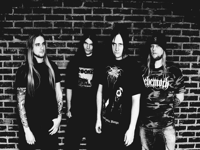 Four Band Members — Black, Serious