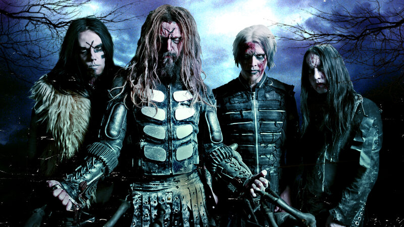 Four Band Members in Costume — Blue