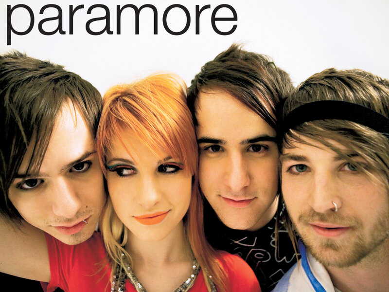 Four Band Members Posing — White, Neutral
