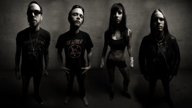 Four Band Members Standing — Black, Dark