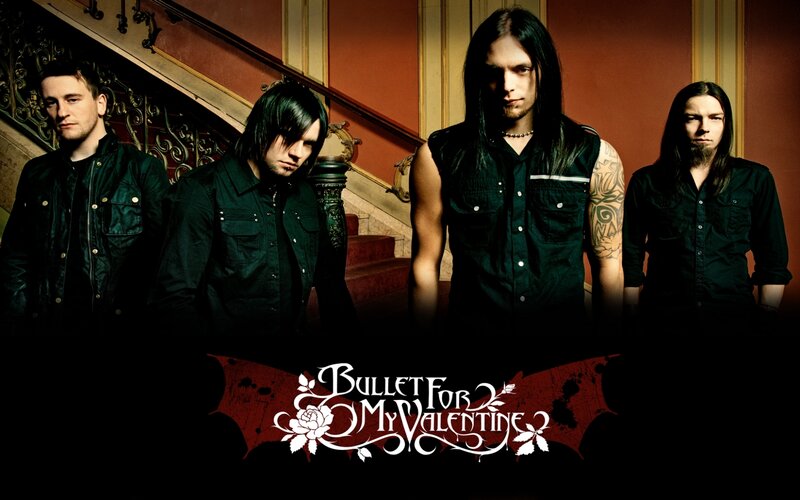 Four Band Members Standing — Black, Dramatic