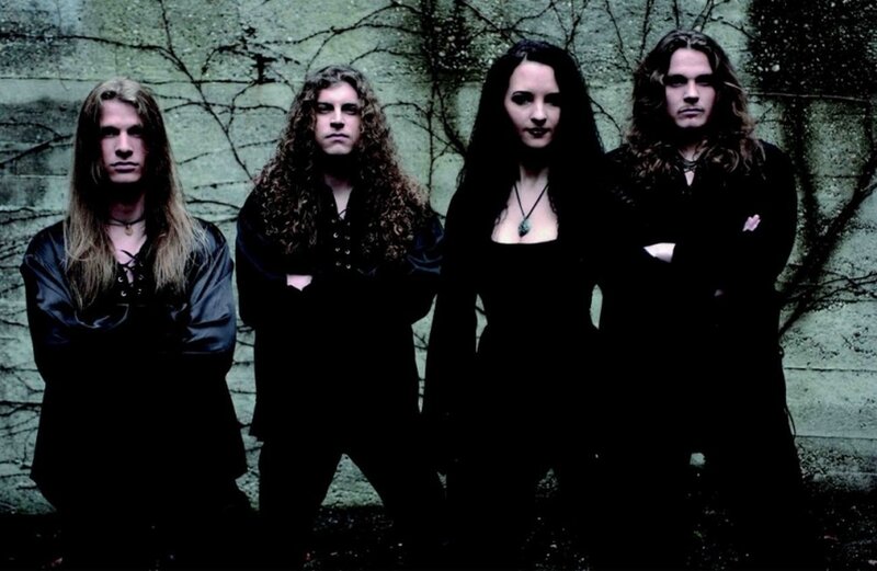 Four Band Members Standing — Black