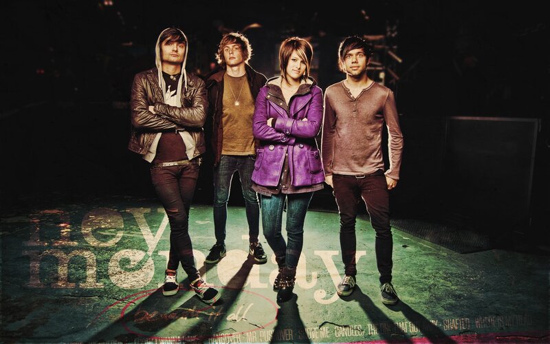 Four Band Members Standing — Purple