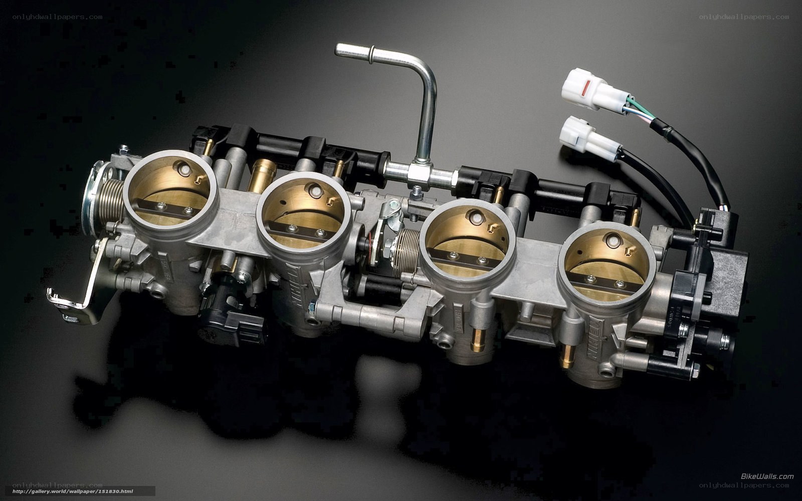 four-barrel carburetor assembly