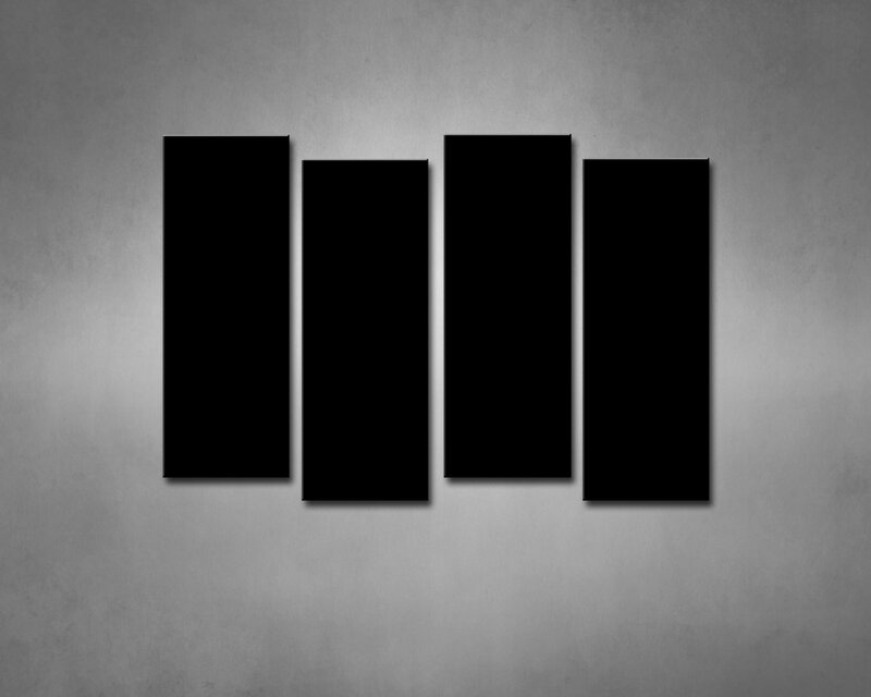 four black panels on gray wall