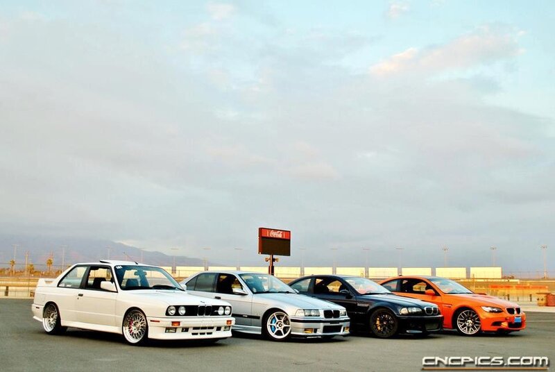 four bmw cars in a row