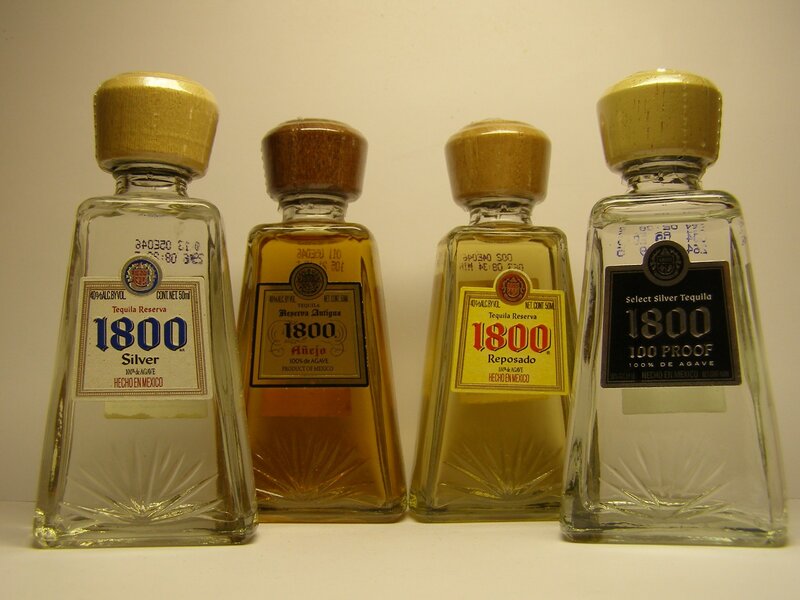 Four bottles of 1800 tequila