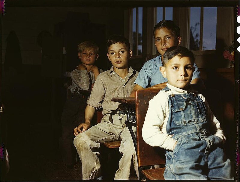 Four boys in a classroom
