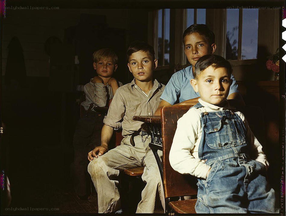 Four boys in a classroom