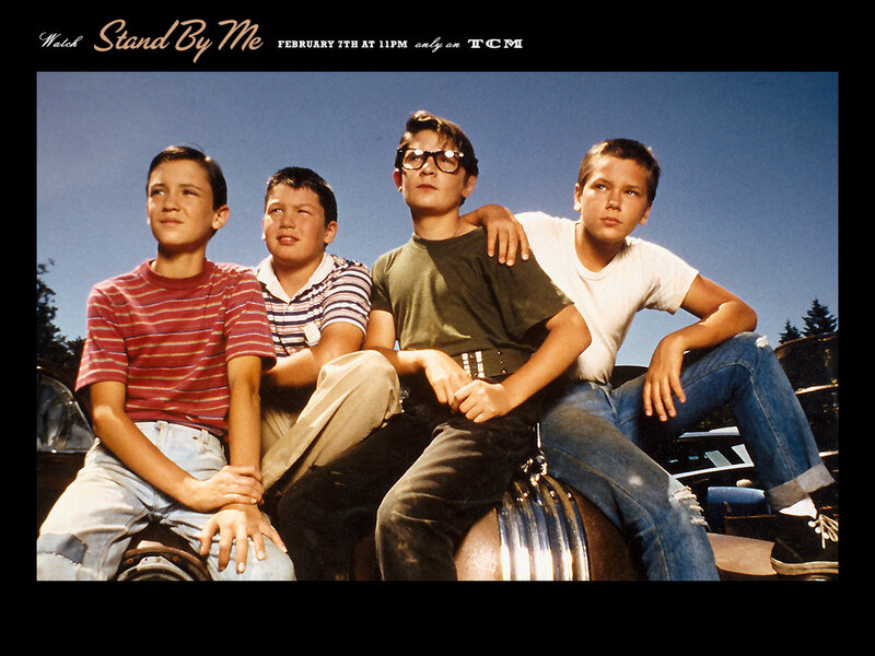 Four Boys Sitting on Car