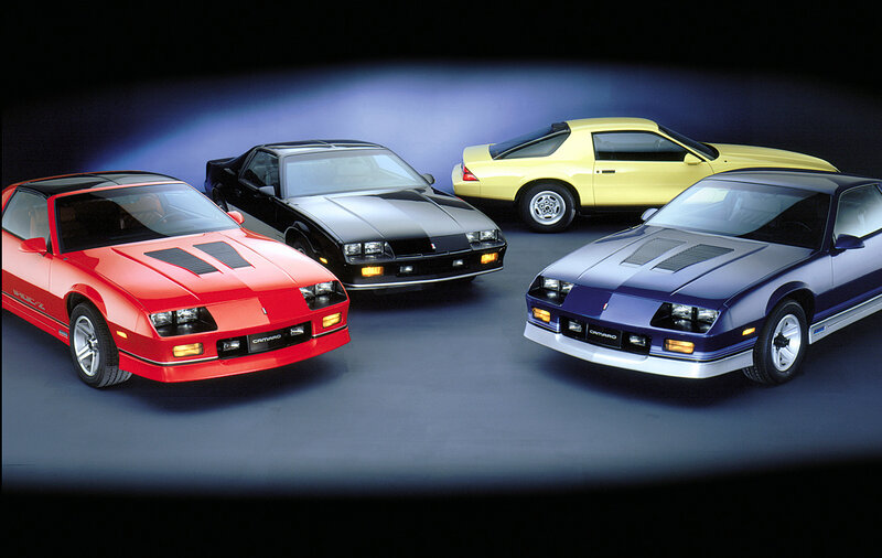 Four Chevrolet Camaro cars