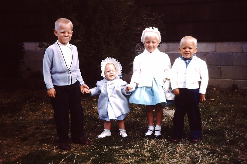 four children in formal wear