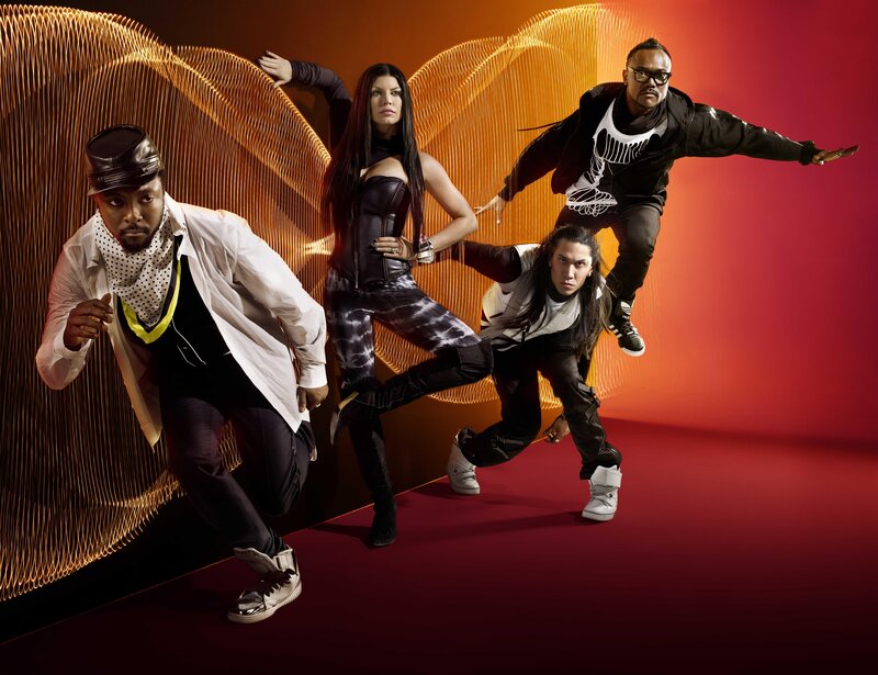 four dancers in dynamic poses
