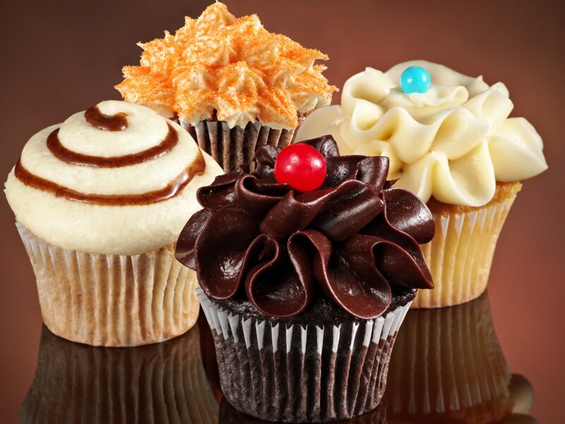 Four Decorated Cupcakes — Brown, Appetizing
