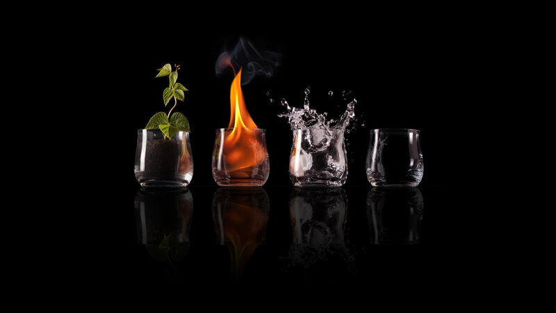 Four elements in glass containers