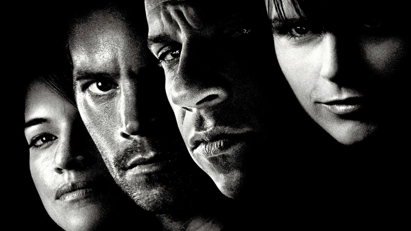 four faces in black and white