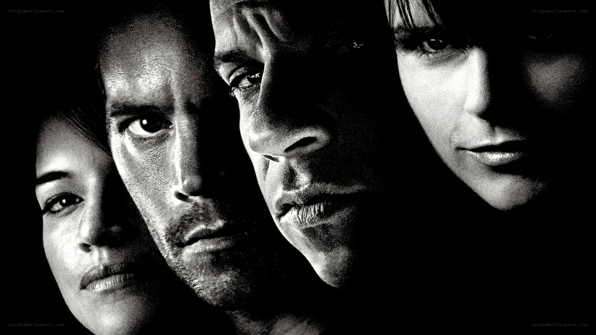 four faces in black and white