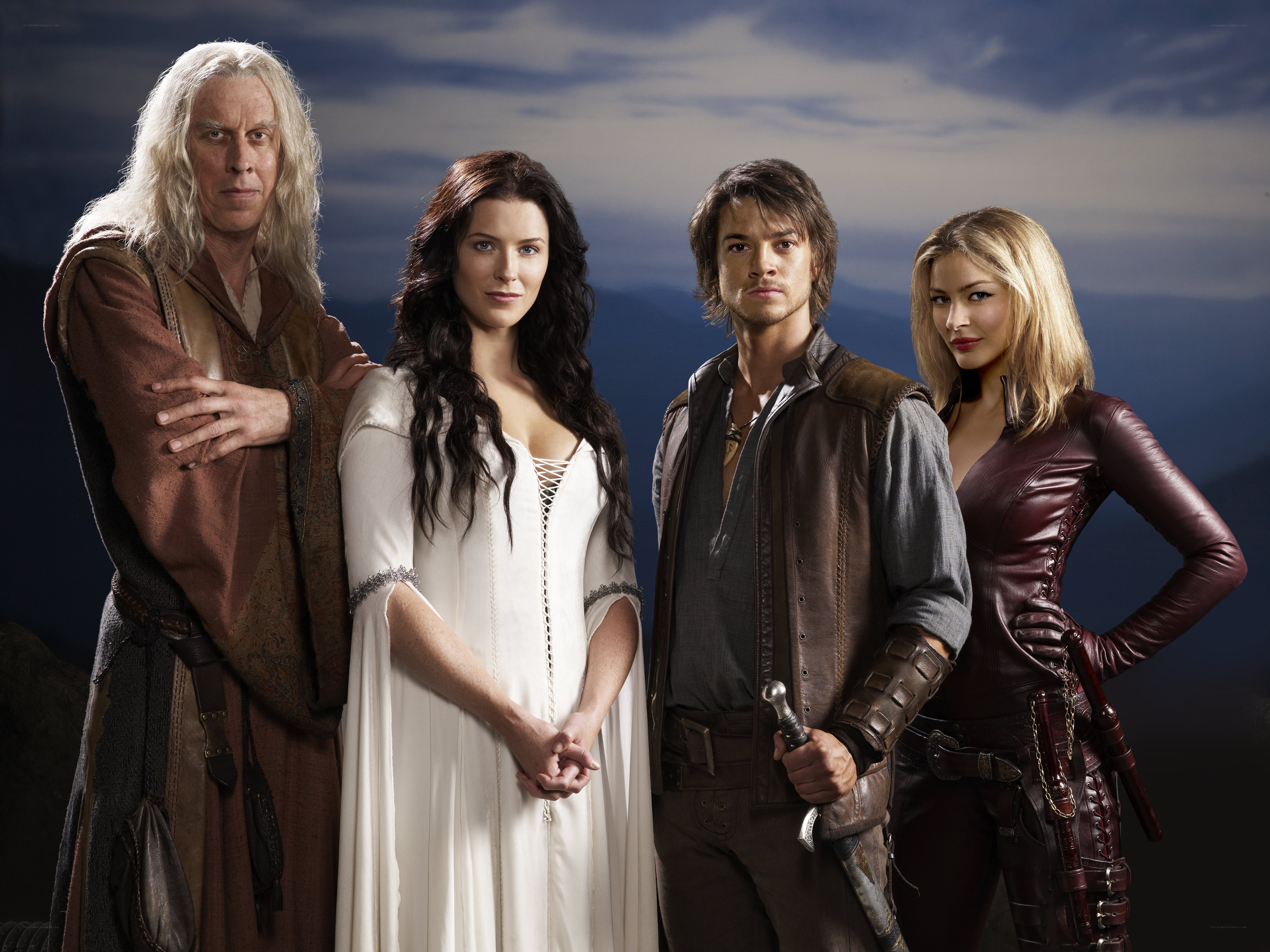 four fantasy characters standing together