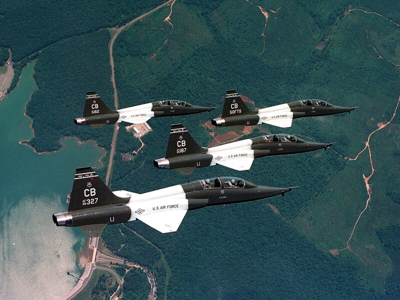 Four Fighter Jets in Formation — Black