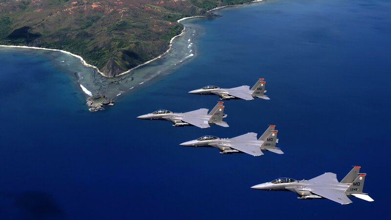 Four Fighter Jets in Formation — Blue, Aerial, Afternoon, Photograph, Ocean, Island