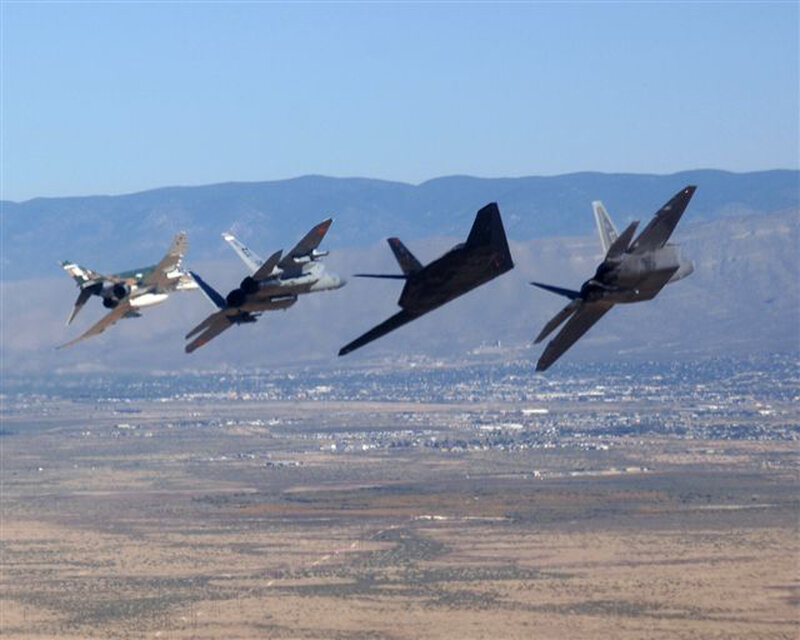 Four Fighter Jets in Formation — Blue, Dramatic, Afternoon, Photograph, Mountains