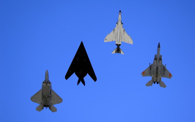Four Fighter Jets in Formation — Blue, Dramatic, Photograph