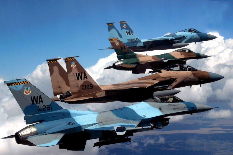 Four Fighter Jets in Formation — Blue, Dramatic
