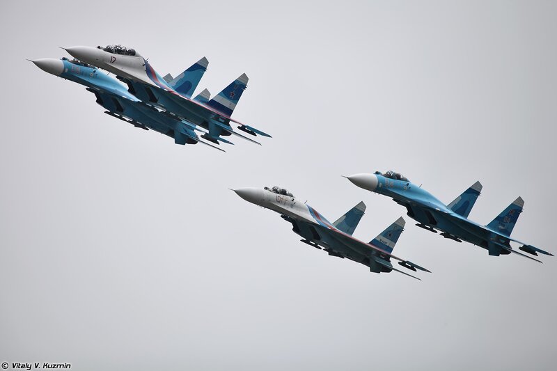 Four Fighter Jets in Formation — Blue, Dynamic, Photograph, Aircraft