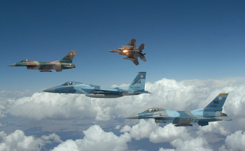 Four Fighter Jets in Formation — Blue, Serene