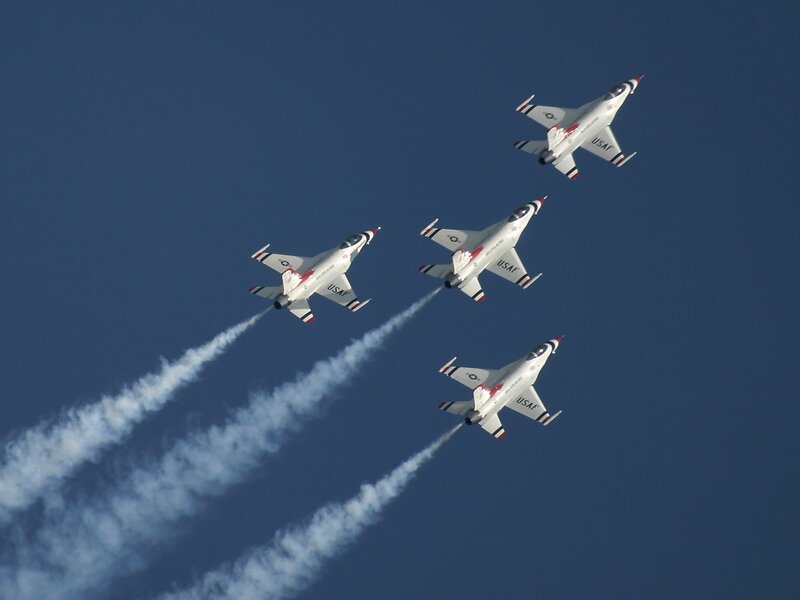 Four Fighter Jets in Formation — Blue
