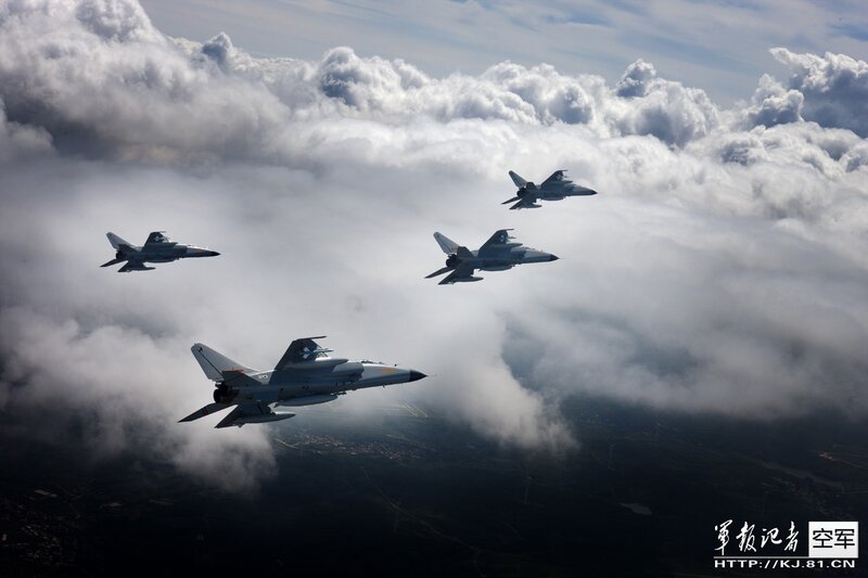 Four Fighter Jets in Formation — Gray, Dramatic, Afternoon, Photograph, Clouds
