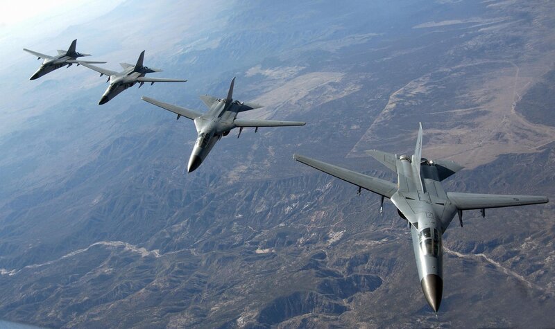 Four Fighter Jets in Formation — Gray, Dramatic