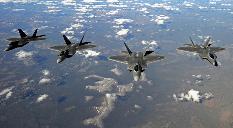 Four Fighter Jets in Formation — Gray