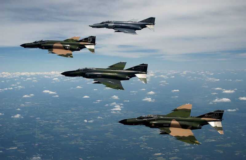 Four Fighter Jets in Formation — Green