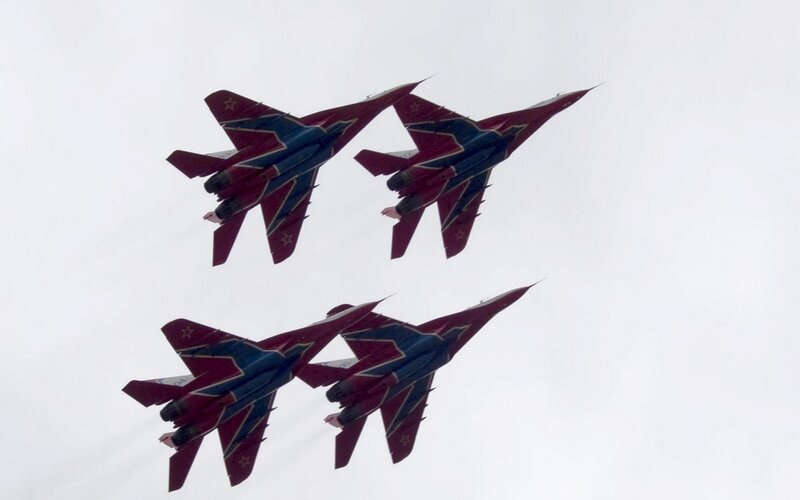 Four Fighter Jets in Formation — Red