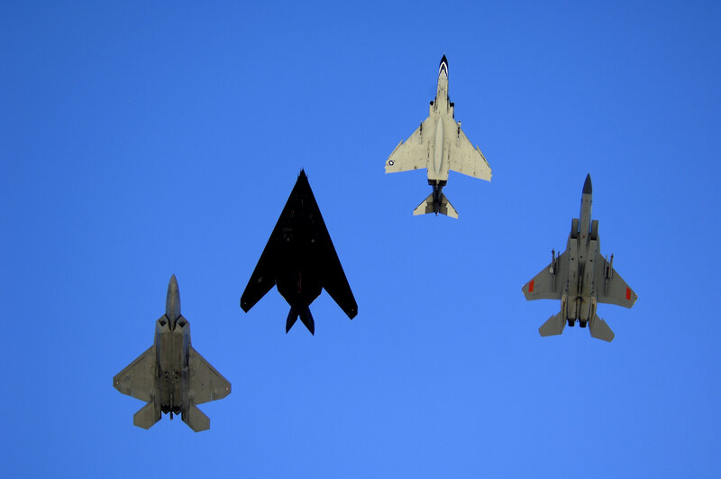 Four fighter jets in formation