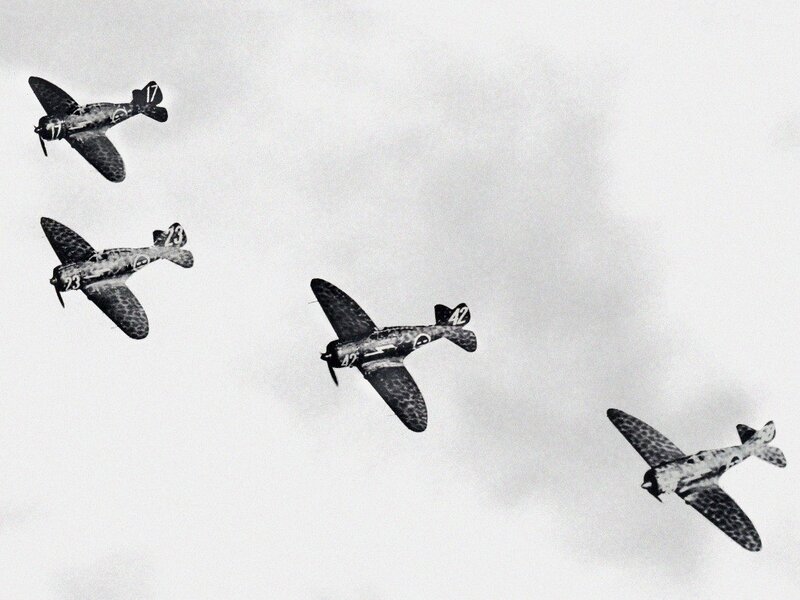 four fighter planes in formation