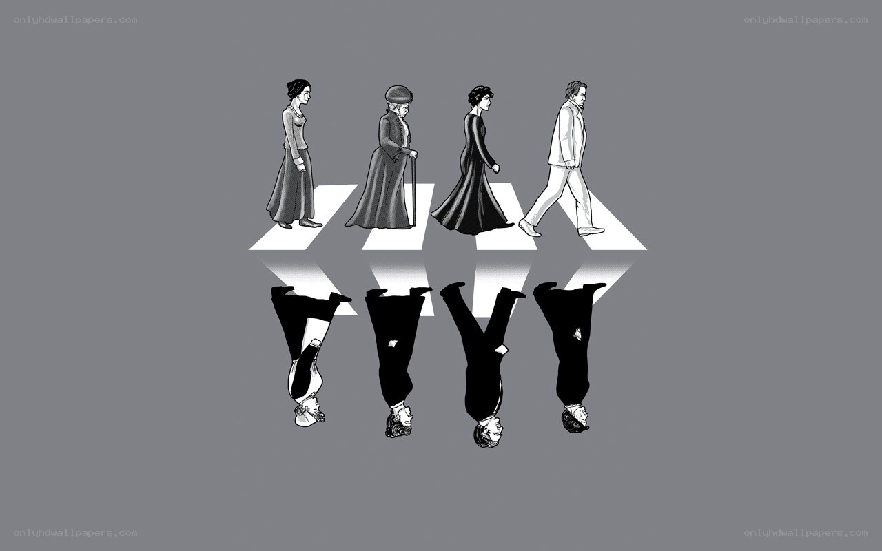four figures crossing a zebra crossing