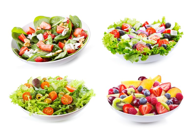 Four fresh salads in bowls