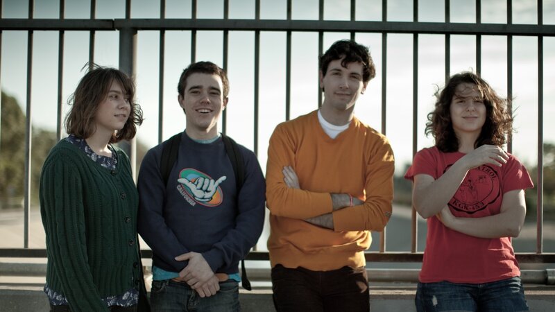 four friends standing together