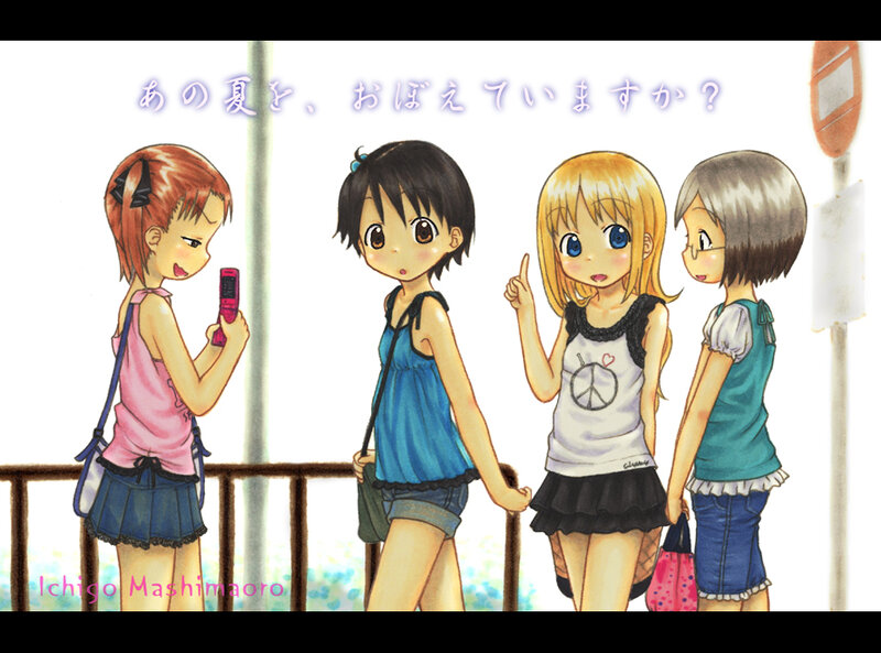 Four girls at a bus stop