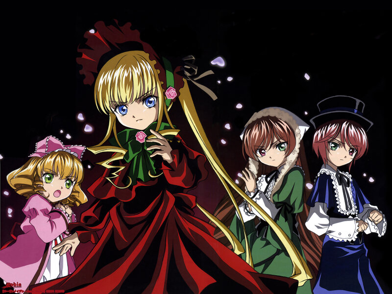 Four girls in a dark scene