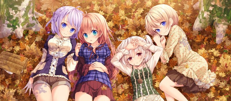 Four girls in autumn leaves