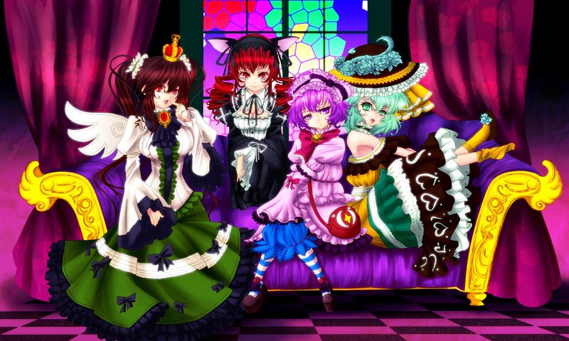 Four girls in colorful dresses