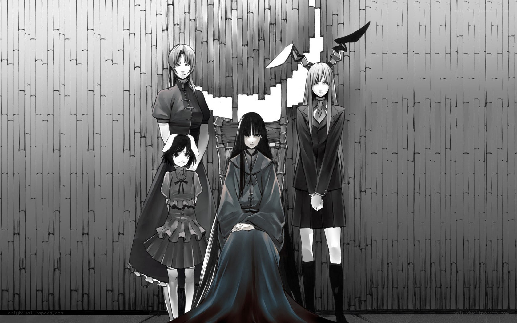 four girls in dark dresses