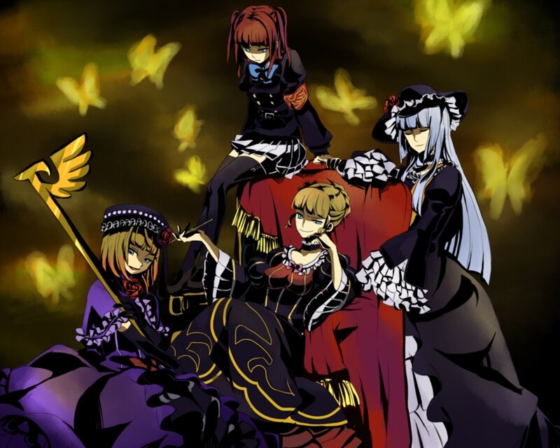 four girls in gothic dresses