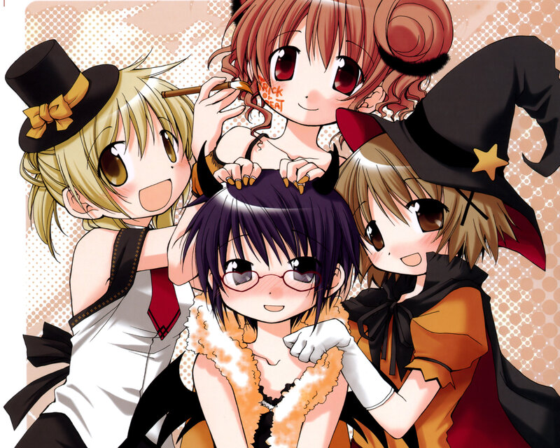 Four girls in Halloween costumes