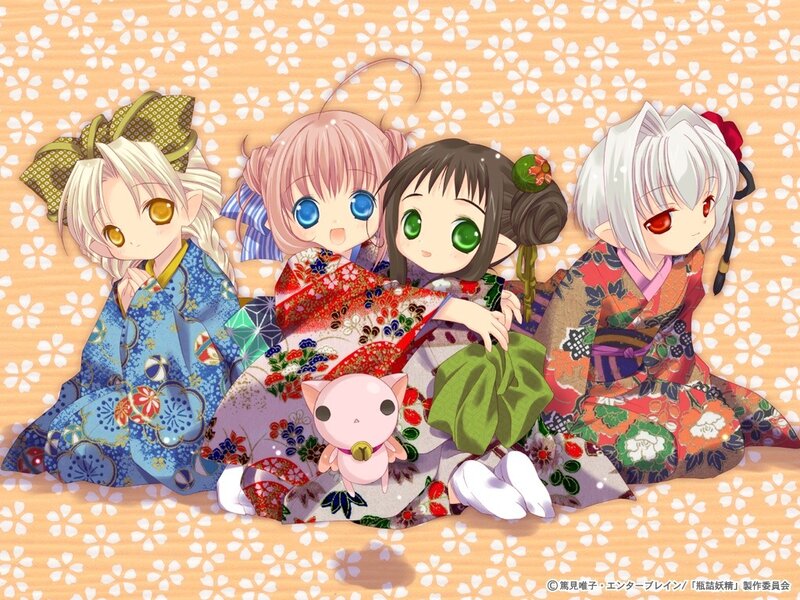Four girls in kimonos with a cat